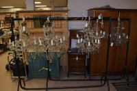 Lot 708 - Five modern crystal chandeliers with electric...