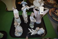 Lot 789 - Lladro ceramic figurines depicting girls with...