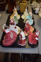 Lot 824 - Coalport ceramic figurines, to include:...
