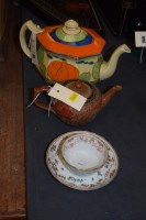 Lot 897 - A Fantasque by Clarice Cliff teapot; a Doulton...