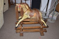 Lot 1029 - An early 20th Century restored rocking horse,...