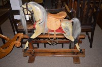 Lot 1032 - An early 20th Century restored rocking horse,...