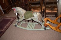 Lot 1034 - A restored rocking horse, the dapple grey...