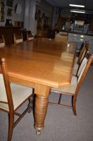 Lot 1046 - Oak extending dining table with three leaves,...