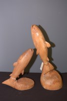 Lot 45 - Two carved models of leaping salmon, 57cms and...
