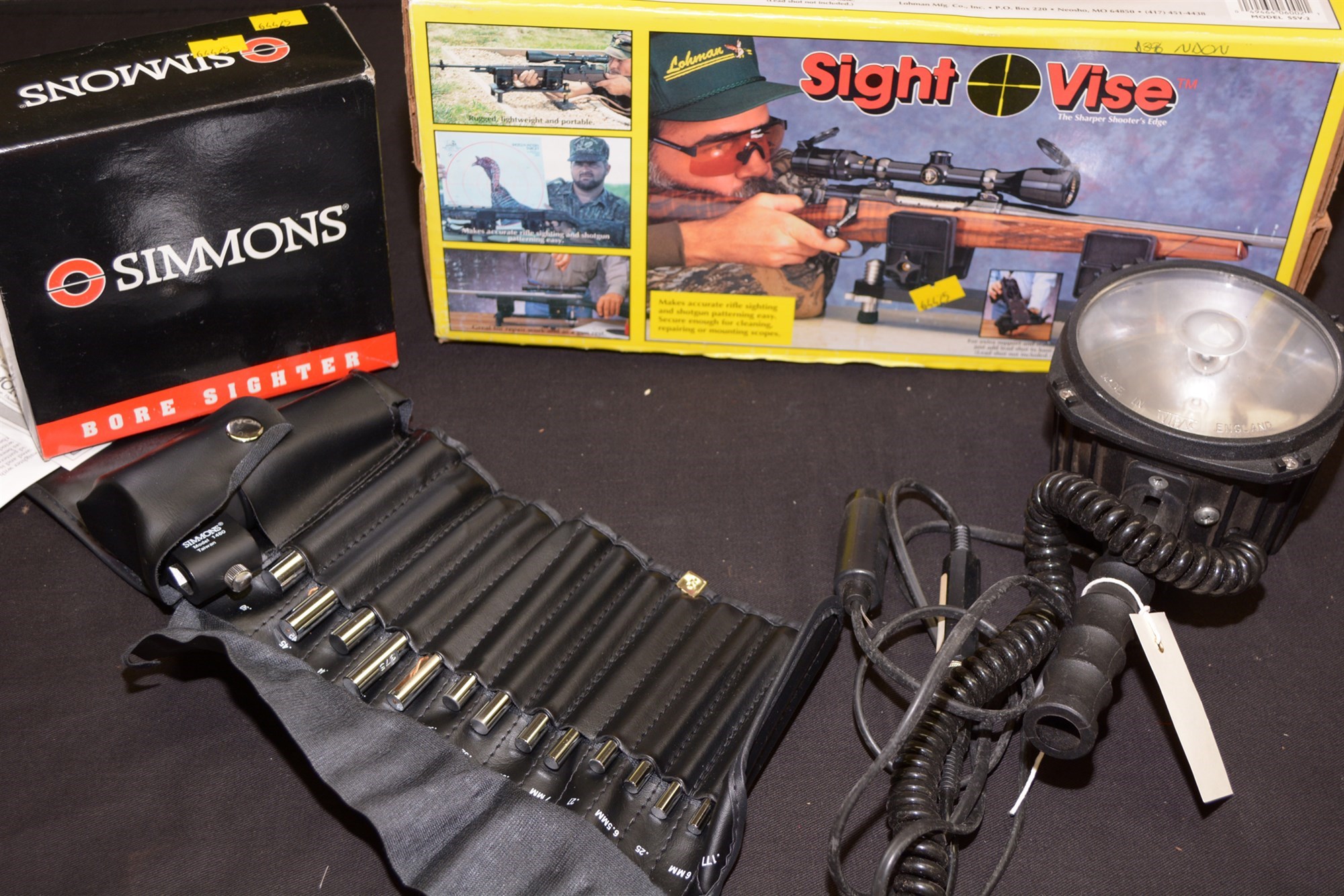 Lot 64 A Simmons bore sighting apparatus, with vinyl