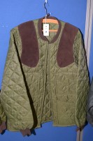 Lot 74 - A Barbour Sutherland green quilted shooting...