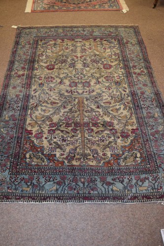 Lot 914 - A Turkish prayer rug, decorated with birds,...