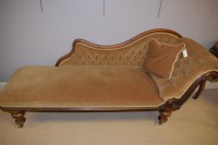 Lot 972 - A Victorian carved mahogany chaise longue,...