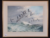Lot 136 - Cecil Hodgkinson - geese in flight over the...
