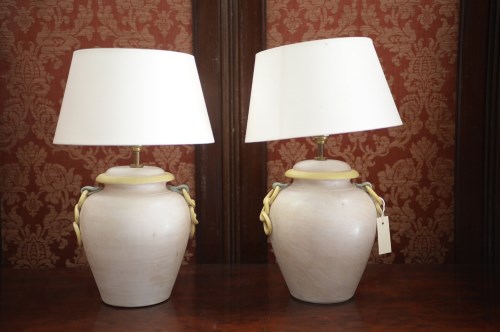 Lot 34 - A pair of ceramic table lamps in the form of...