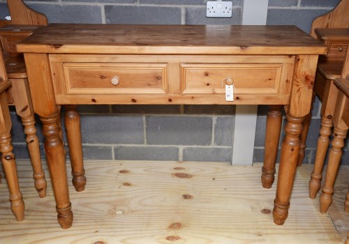 Lot 85 - A modern pine side table, fitted two frieze...