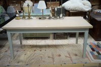 Lot 120 - A modern rectangular bleached oak dining table,...