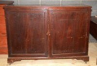 Lot 134 - A George III mahogany bed cupboard, the...