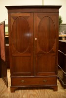 Lot 136 - A Georgian mahogany wardrobe with flared...