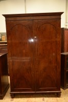 Lot 148 - A William IV mahogany linen press cupboard...