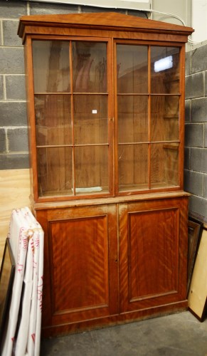 Lot 155 - An early 19th Century mahogany bookcase, with...