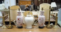 Lot 168 - Two pairs of brass table lamps; together with...