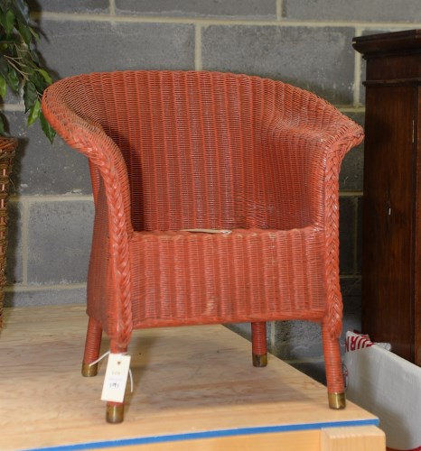 Lot 191 - A child's red Lloyd Loom easy chair, with...