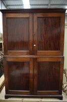 Lot 249 - A Georgian mahogany linen press cupboard, with...