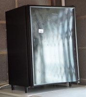 Lot 280 - A small black Electrolux bench top fridge...