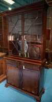 Lot 329 - A George III style mahogany bookcase, with...