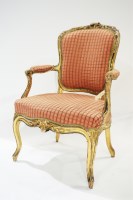 Lot 338 - A Louis XV giltwood fauteuil, the...
