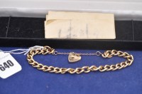 Lot 640 - A 9ct. yellow gold chain link bracelet with...