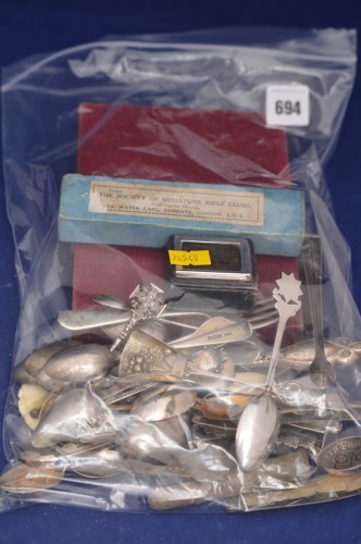 Lot 694 - A set of six white metal teaspoons with blue...