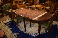 Lot 1173 - A George III mahogany D-end dining table,...