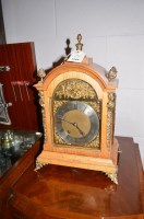 Lot 1244 - A reproduction oak cased mantel clock with...