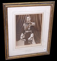 Lot 135 - A signed photograph of His Majesty George VI...