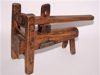 Lot 275 - A Chinese carved rustic noodle maker; together...