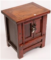 Lot 238 - A Chinese red painted side cabinet with a pair...