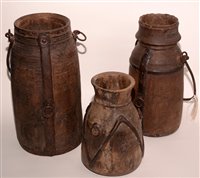 Lot 261 - Three metal mounted wooden Indian water vessels.