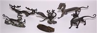 Lot 266 - A patinated bronze model of a grasshopper;...