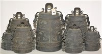 Lot 265 - A set of seven Chinese graduated patinated...