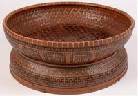 Lot 253 - A large Chinese rattan basket, 78cms diameter.