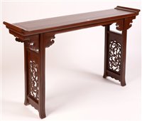 Lot 230 - A Chinese elm alter table with pierced ends,...