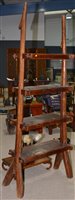Lot 232 - A set of Indonesian hardwood rustic shelves of...