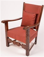 Lot 236 - A Spanish stained wood open arm easy chair...