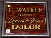 Lot 201 - A gilt and scumble glass advertising sign for...