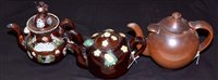 Lot 211 - A 19th Century sprig ware double spouted...