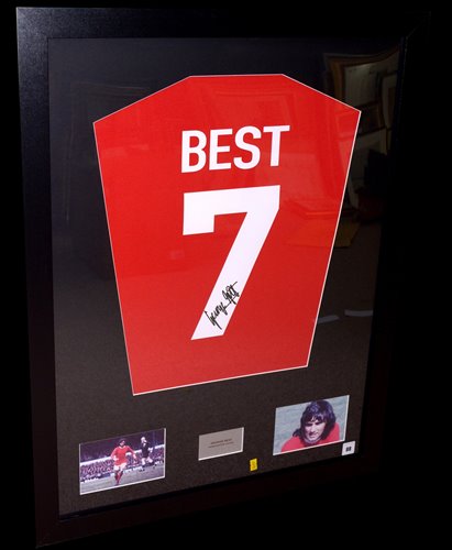 Lot 88 - A George Best replica shirt signed on No.7,...
