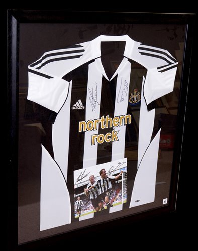 Lot 92 - A Newcastle United replica shirt signed by...