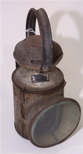 Lot 158 - An unmarked railway lamp with clear red and...