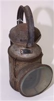 Lot 158 - An unmarked railway lamp with clear red and...
