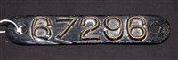 Lot 174 - A black painted cast bronze number plate...