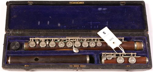 Lot 5 - An Isidor Lot B&S model L rosewood flute...