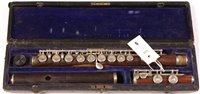 Lot 5 - An Isidor Lot B&S model L rosewood flute...
